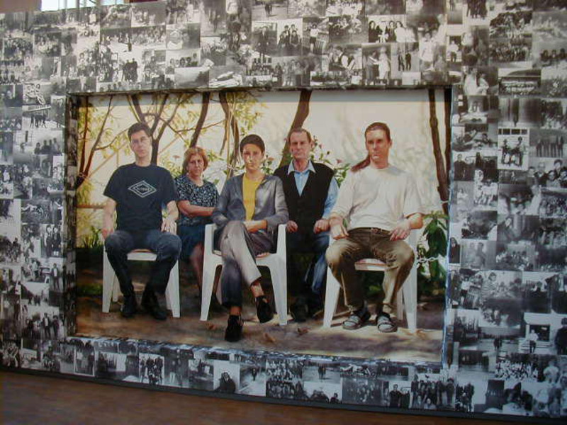 Object Happy Bosnian Family, 2000, 300x500x820 cm, wood, paper, pictures